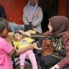 Ketua TP PKK Kota Cilegon Alfi Robinsar Serahkan Bantuan Kursi Roda kepada Penyandang Disabilitas